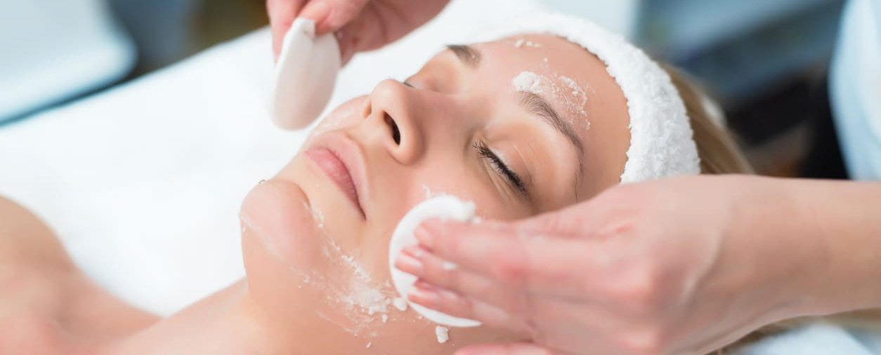 Picture of a person receiving facial exfoliation
